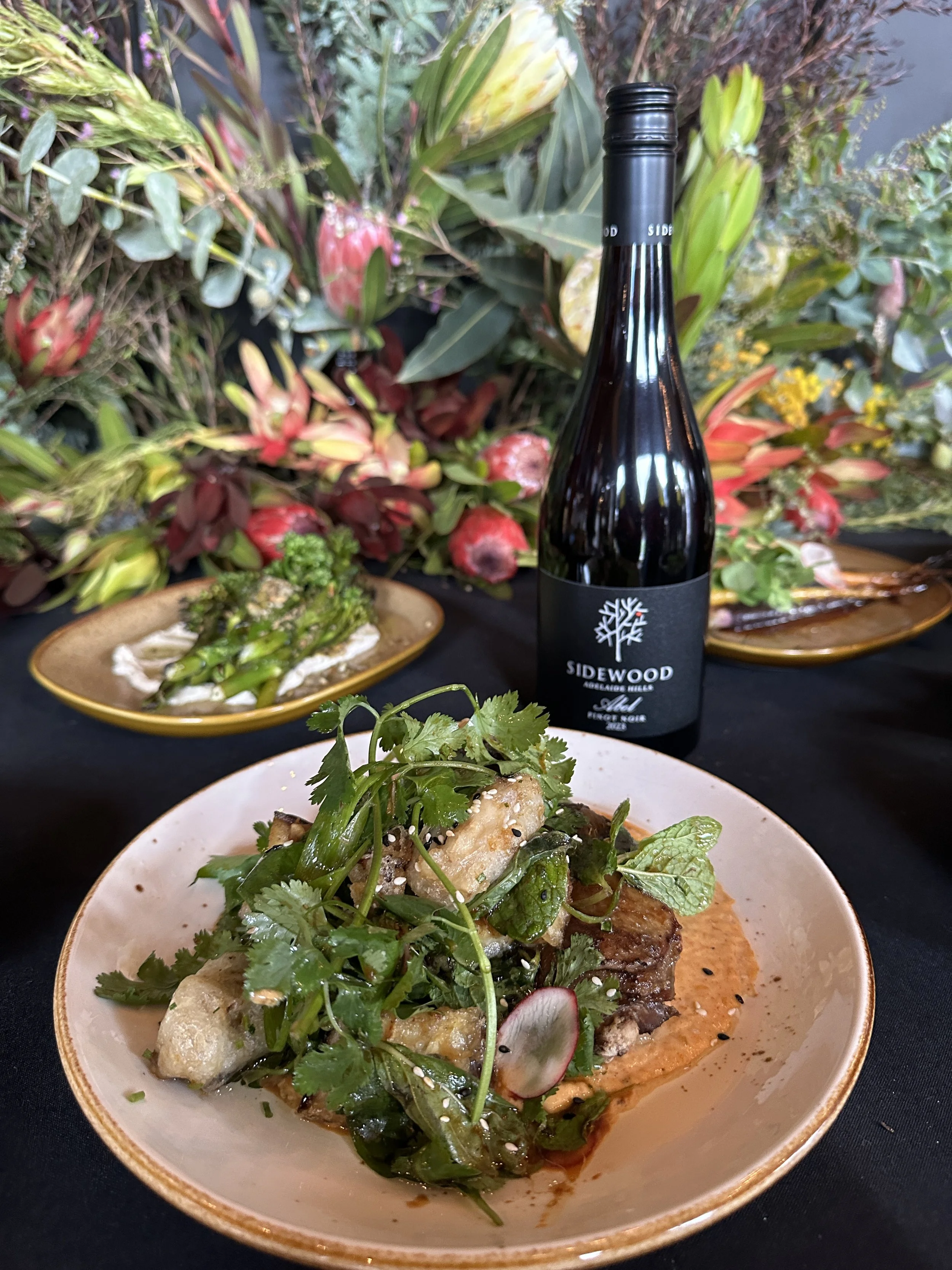 MAIN - Smokey crispy duck leg, red curry sauce, miso eggplant salad (gf/df/va)