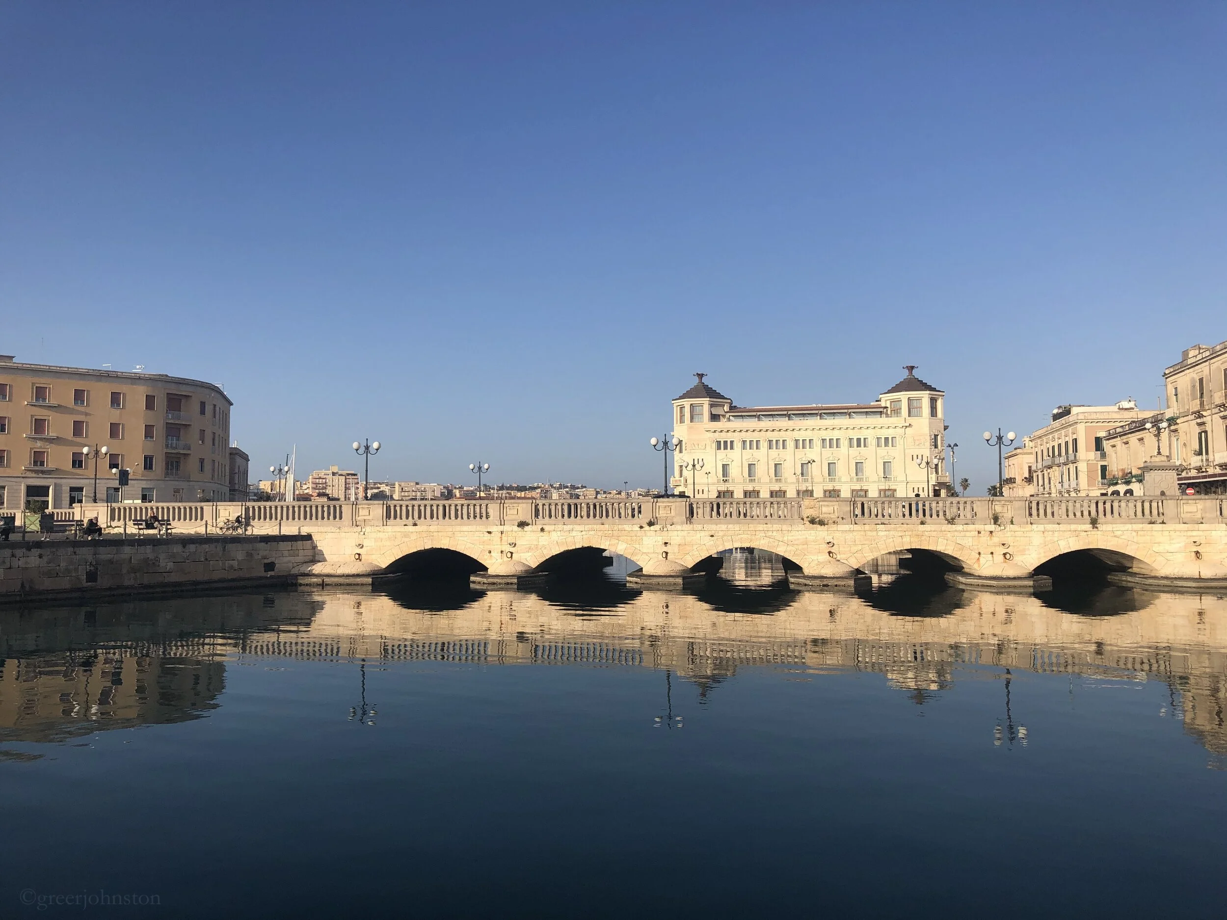 A walk across this bridge, and you are a world away