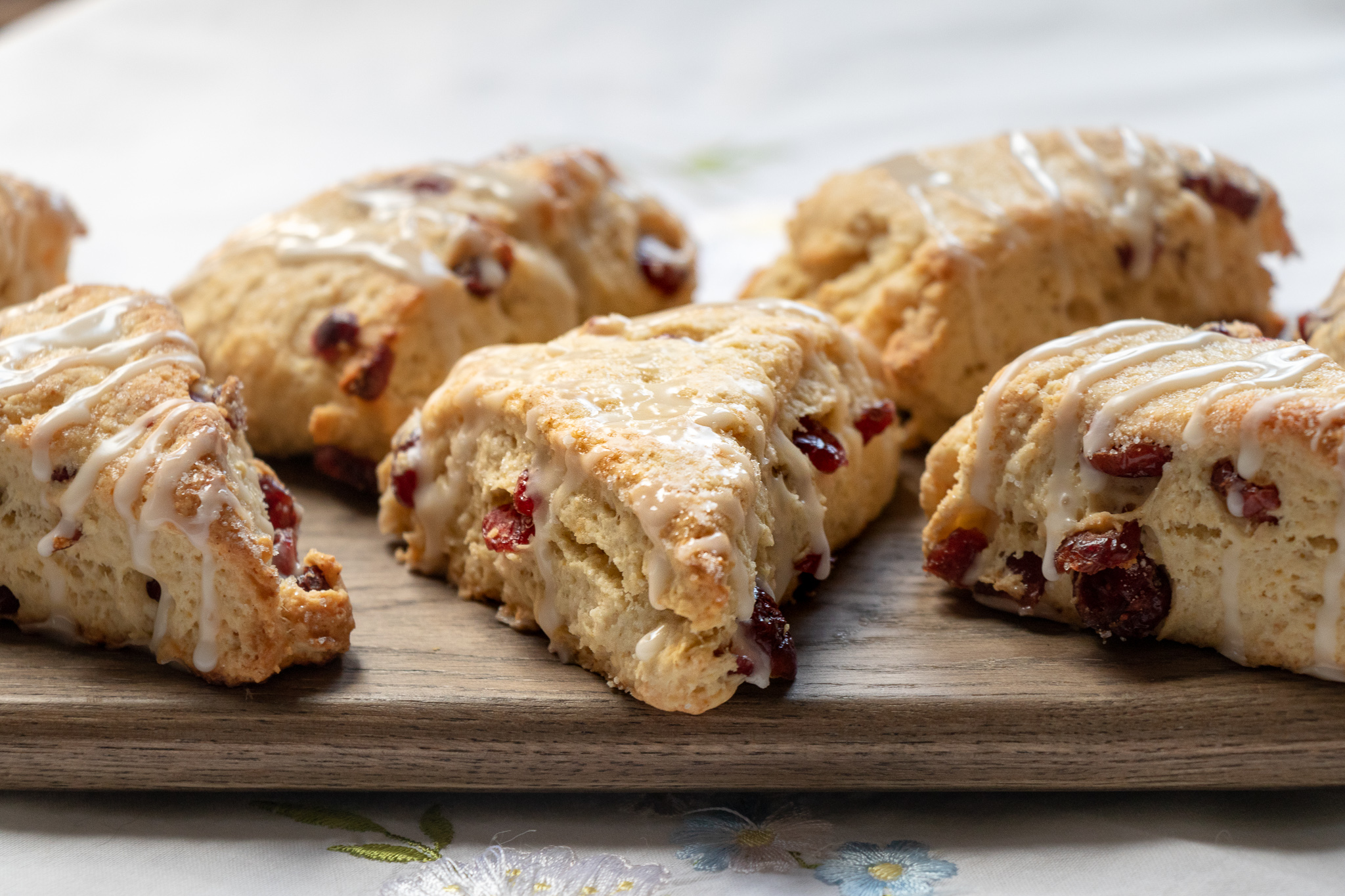 I love to bake, but my 12 year old daughter love to bake more. One of our favorite things to do together is veganize our favorite old treats. These scones are super simple to whip up. So simple that our daughter did the baking on these beauties. If a 12 year old can bake up a perfect batch of these cranberry scones, so can you!