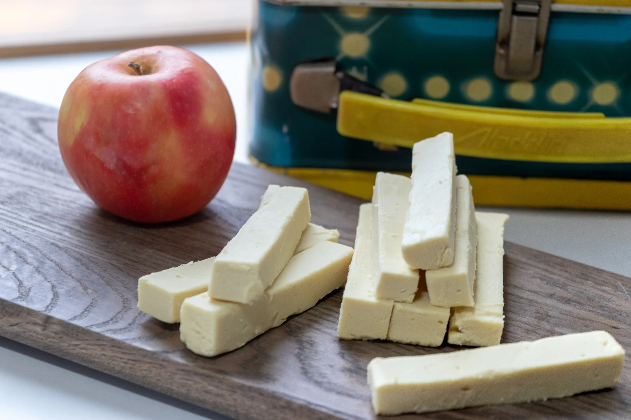Who doesn’t miss cheese sticks?! Half of my kids had never even had one, so I knew I needed to try and create a vegan cheese stick recipe so I could share this snack joy with them!. These dairy free, vegan mozzarella cheese sticks are super simple to whip together. They are made with coconut milk, making them more allergen friendly for kids to pack in their school lunches, because the last thing we want to do is exclude anyone with a nut allergy from this tasty treat!!! So happy snacking, everyone!