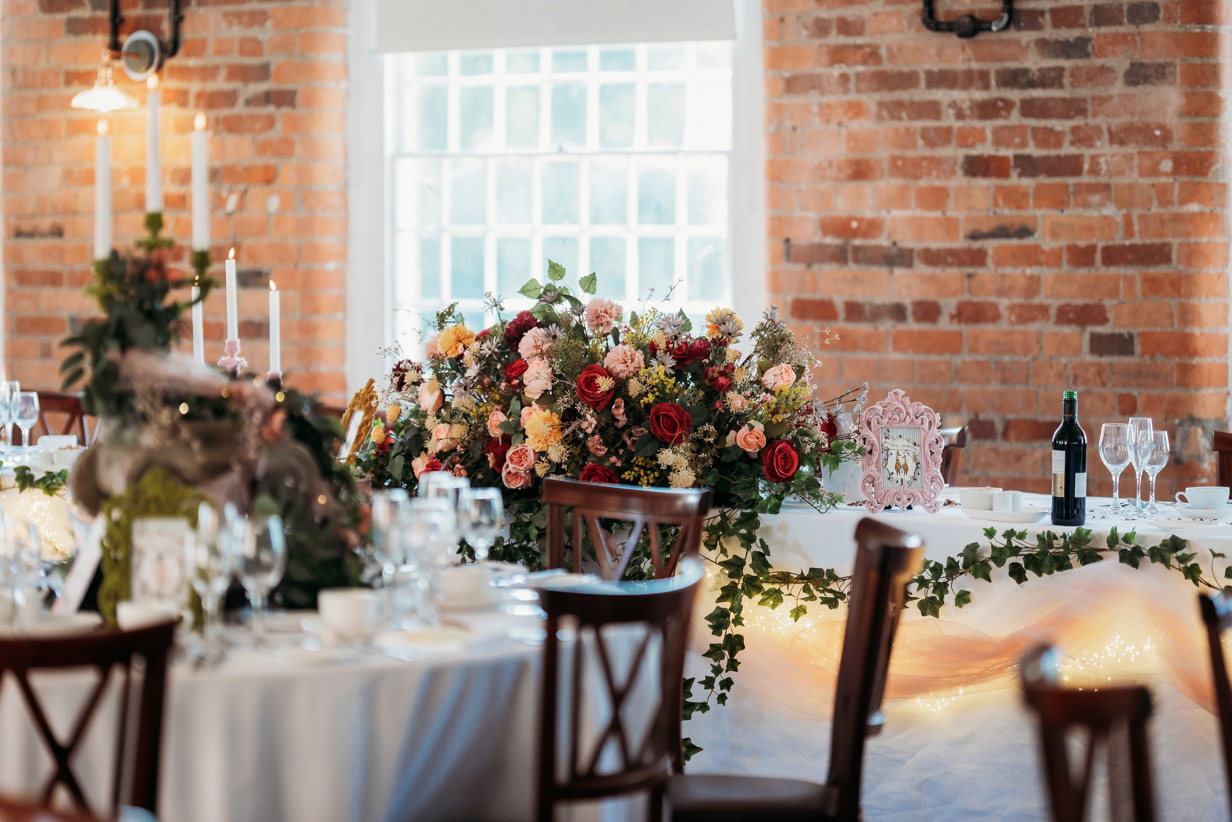 floral wedding top table centrepiece