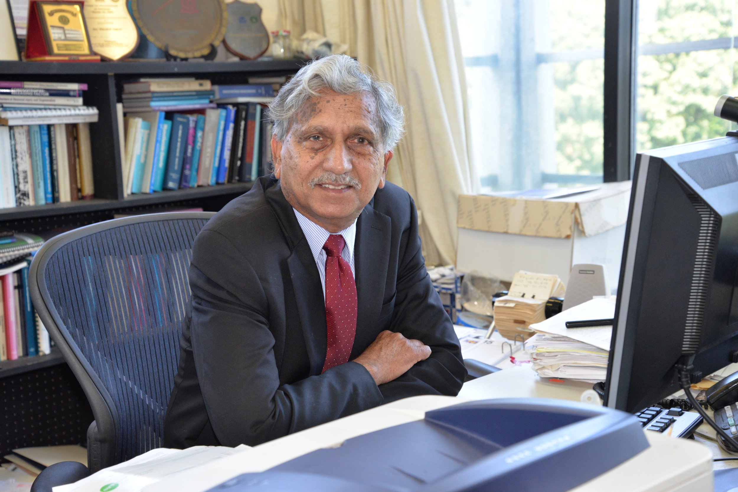 Dr. Khalid Iqbal, President