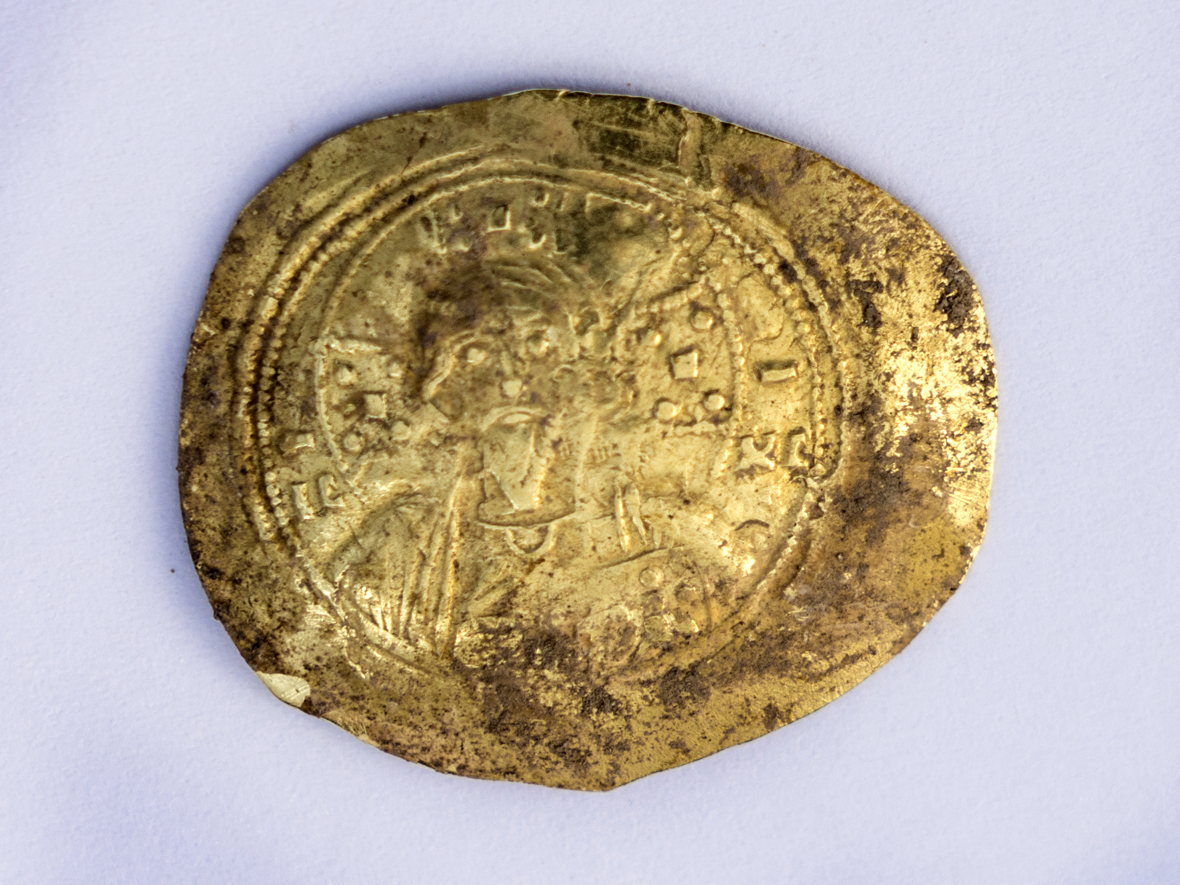  Gold coin “nomisma” of the Byzantine emperor Romanos III (1028 – 1034 CE.  Photo: Yaniv Berman,  courtesy of the Caesarea Development Corporation 