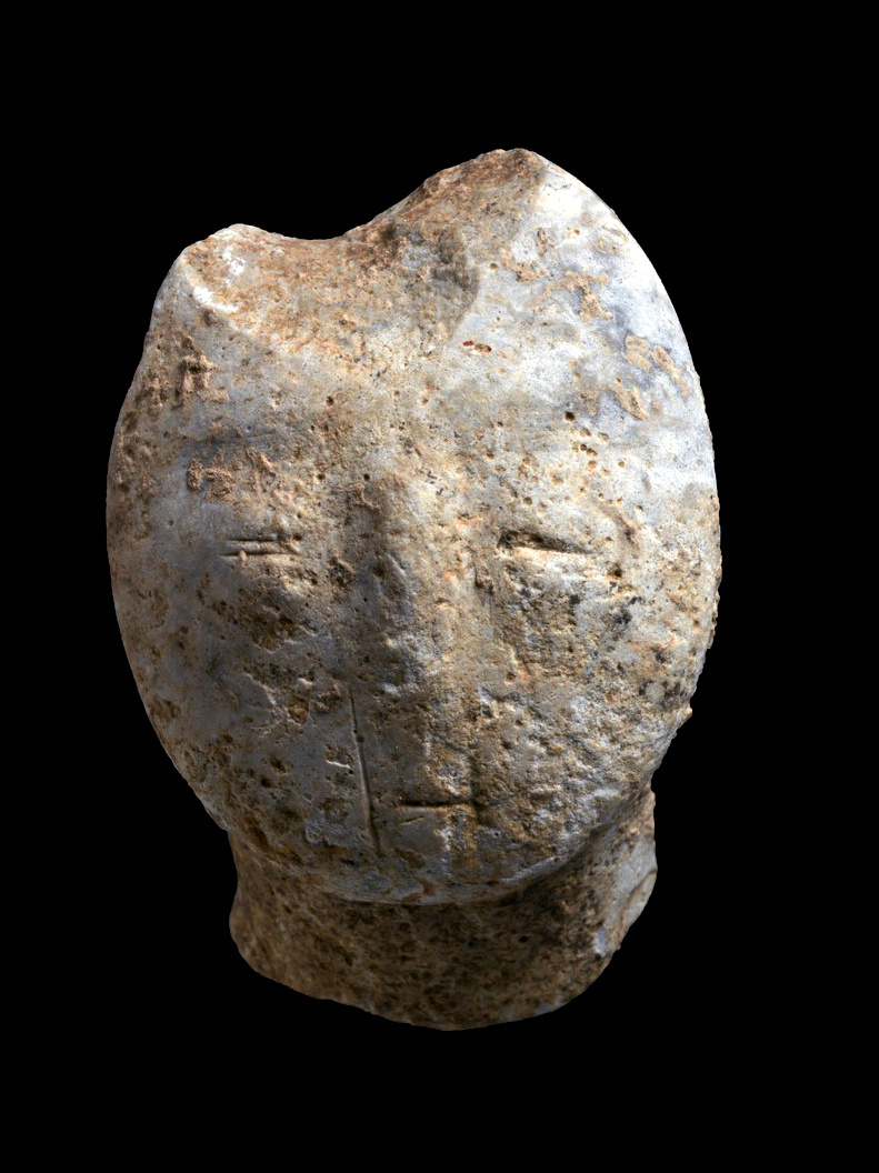 9,000 years old figurine, depicting a human face. 