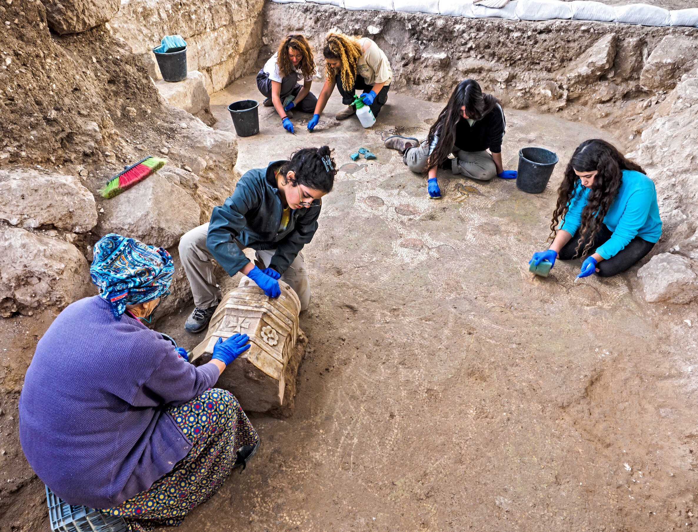 Youth participating in excavation.