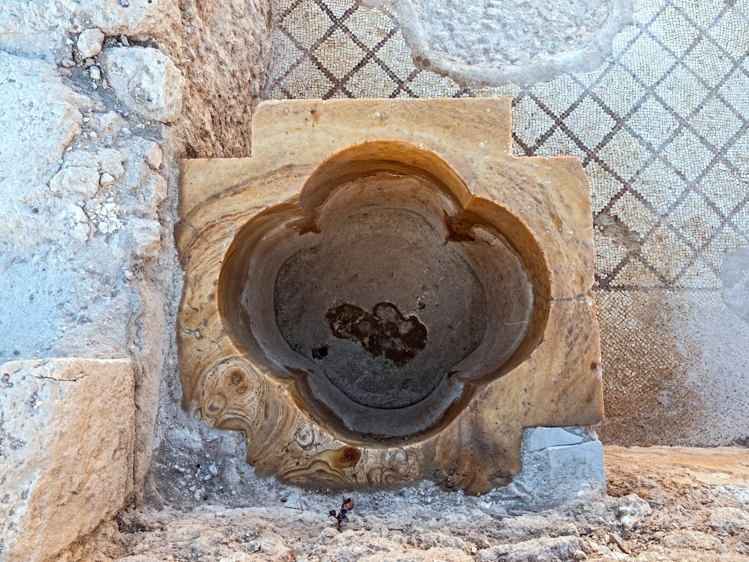 Cross-shaped baptismal.