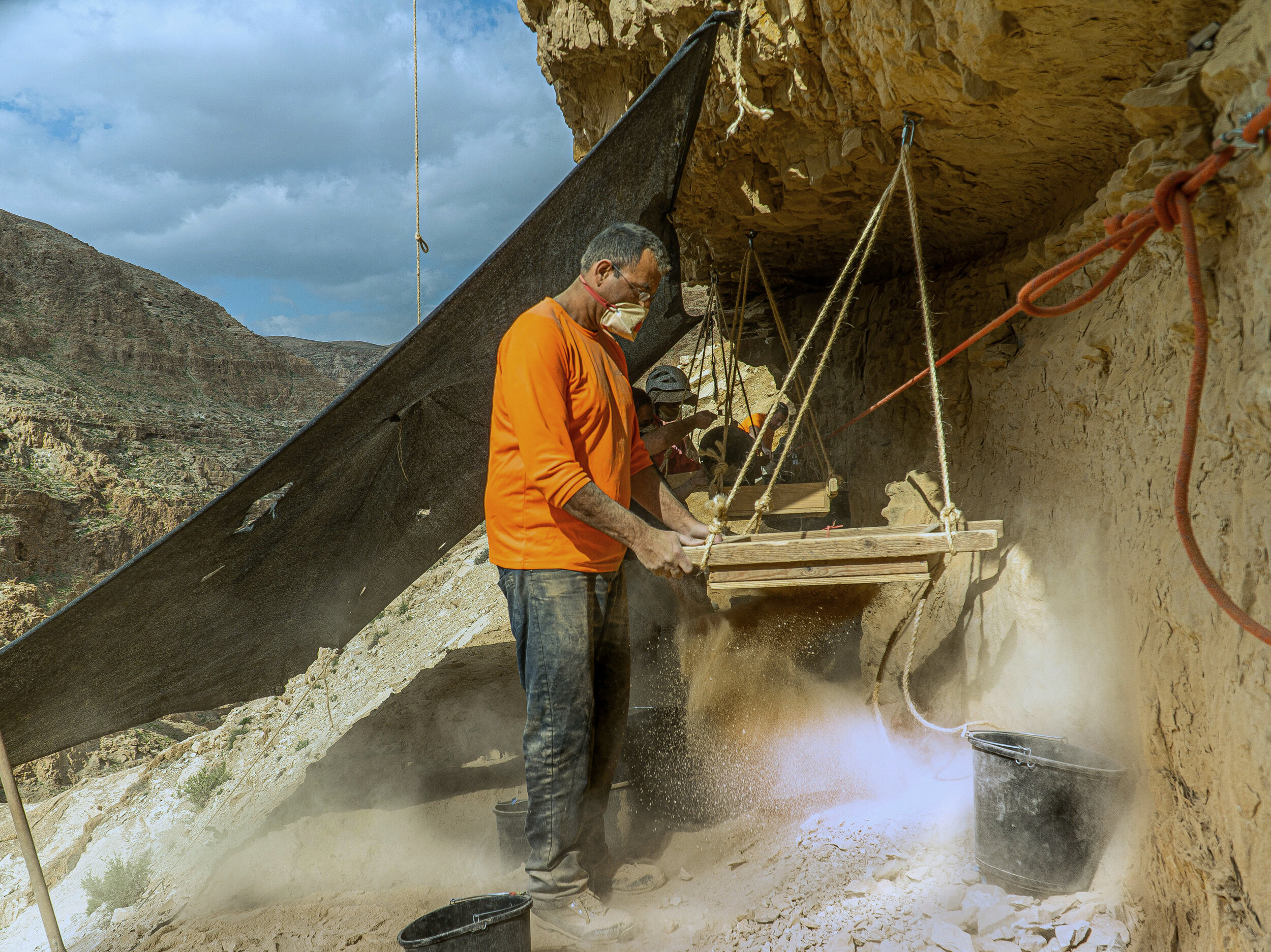 11.Sifting finds at the entrance to Murbaat Cave. Photo Yaniv Berman Israel Antiquities Authority.jpg