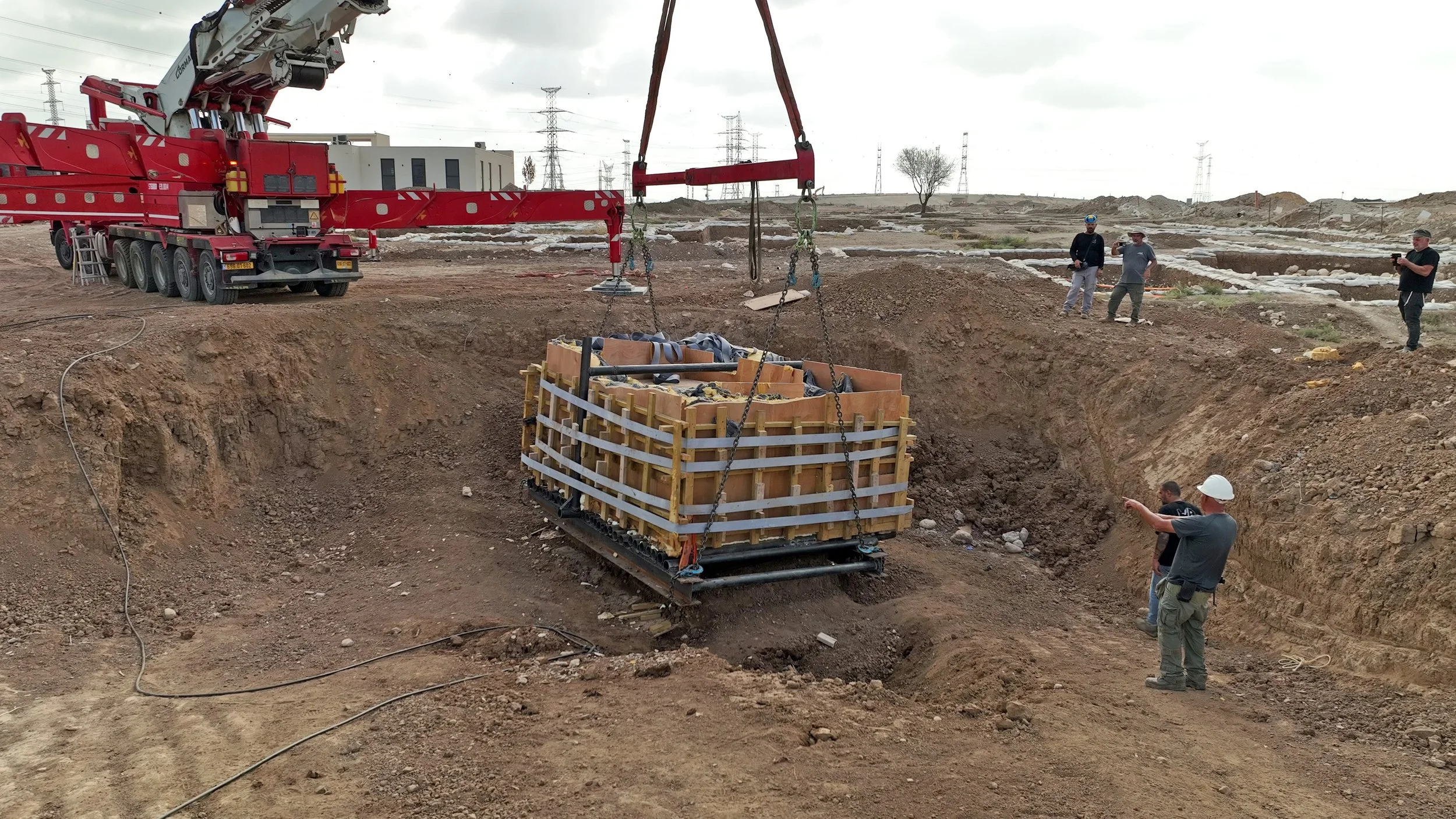 25-ton Second Temple mikveh lifted by crane at Kiryat Gat