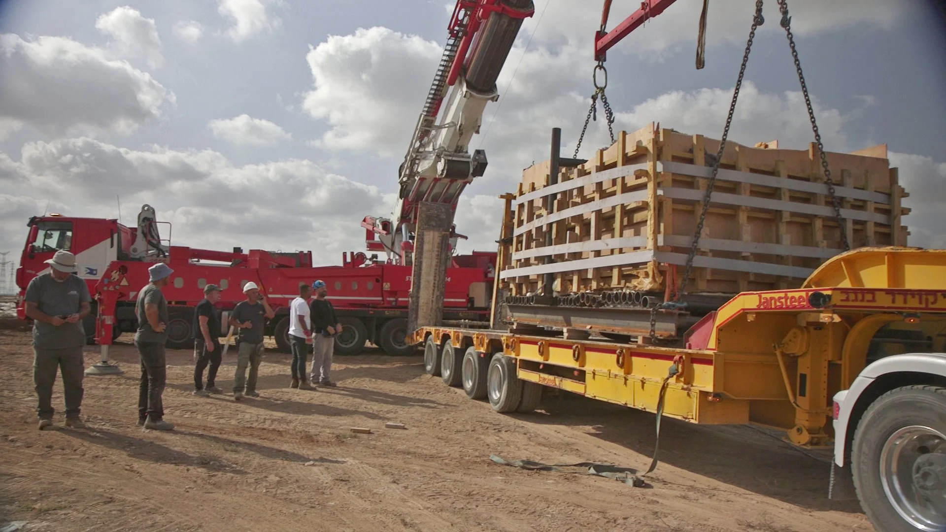 Ancient 25-ton mikveh secured on transport truck in Kiryat Gat