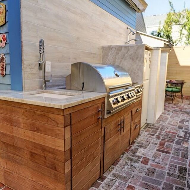 New outdoor kitchen and shower ready for Mardi Gras! #uptown #nola #outdoorliving #bbq #landscape #suncustomlandscapes