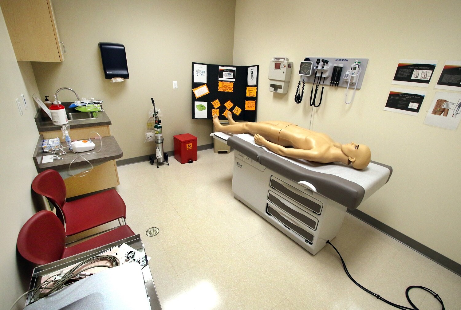 JS1_0011 CHN Clinic 3503 Martin Luther King Dr. Gary Patient room with CPR Dummy.JPG