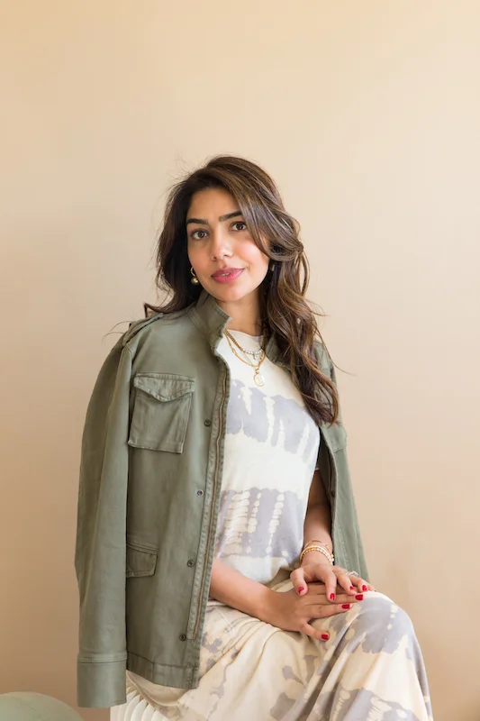 DR. DEEPIKA CHOPRA, OPTIMISM DOCTOR™️ AND MOM TO JAG (21 MONTHS) How do you nurture yourself? "For me, nurturing is really hanging on tightly to my rituals. I'm really big about rituals. I like pairing a physical ritual with a mental one. Research says that works best. I'm kind of a science nerd, so I basically recited the same mantra, Sanskrit mantra, every morning when I wash my face since I was like seven. And I didn't really realize it was a ritual until this year. And I never miss it, and it's something I can do anywhere, like if I'm traveling for work, and it's free. Familial rituals are important, too. On Sundays, my son, husband and I, we listen to The Beach Boys while making breakfast, and I find if I don't get that, all of us, if we don't get that ritual together, we don't feel nurtured for the week ahead." What does self-care mean to you? "It's kind of like what they tell you on an airplane. 'Put your mask on first before you put a child's mask on.' I never quite understood that until now. It's really hard to give when your cup is empty. So for me, it's not about always filling my cup but just noticing where my cup is. Like how full is it? Or what point in my cup do I feel like I just can't take anymore? So knowing my limits and boundaries. For me, this year especially, a huge part of self-care has been boundaries and saying the word no. Yeah, literally RSVPing 'no' is a form of self-care." Find out more about Dr. Deepika Chopra by following along on Instagram!