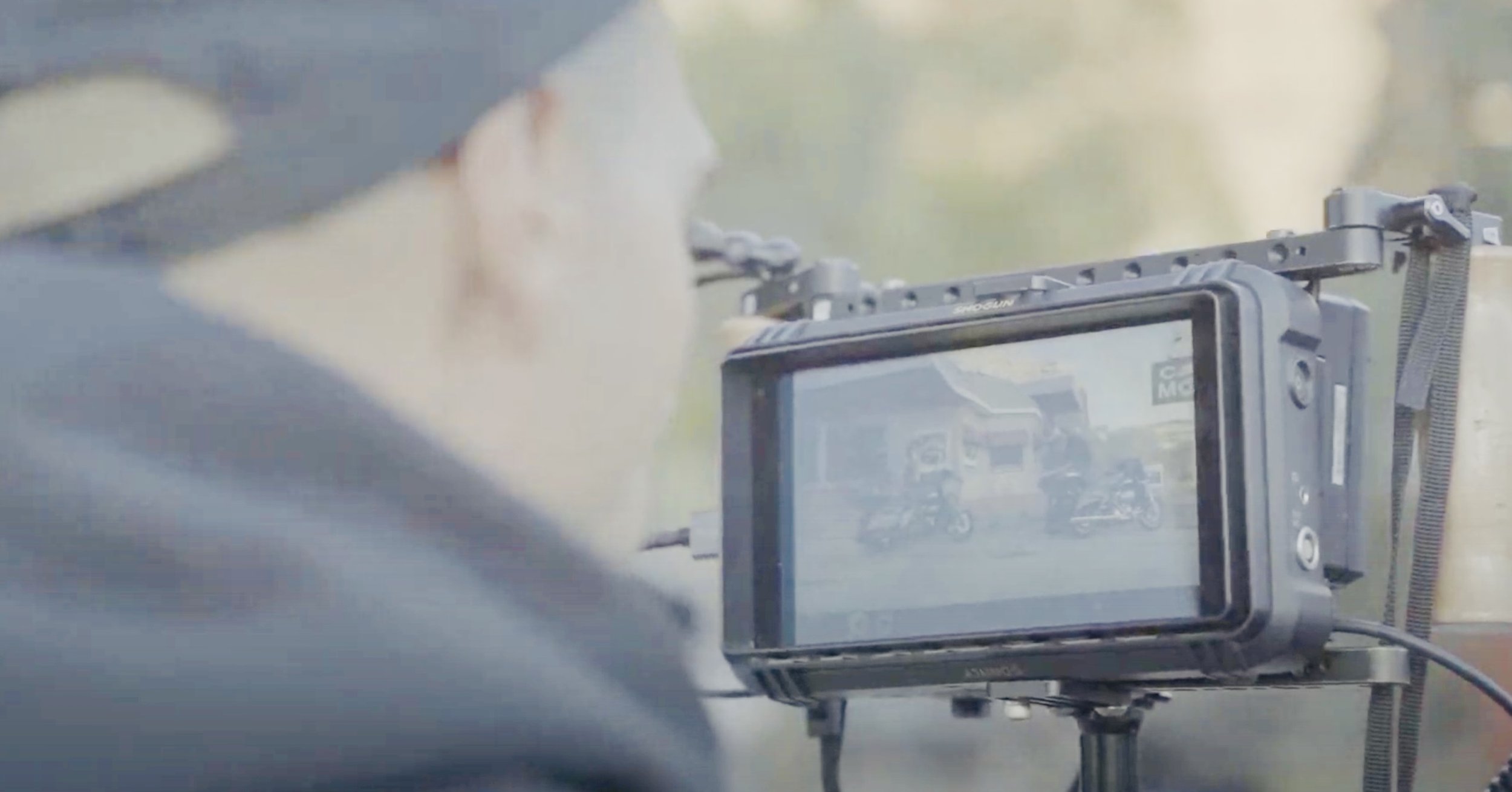 Reviewing footage on camera monitor