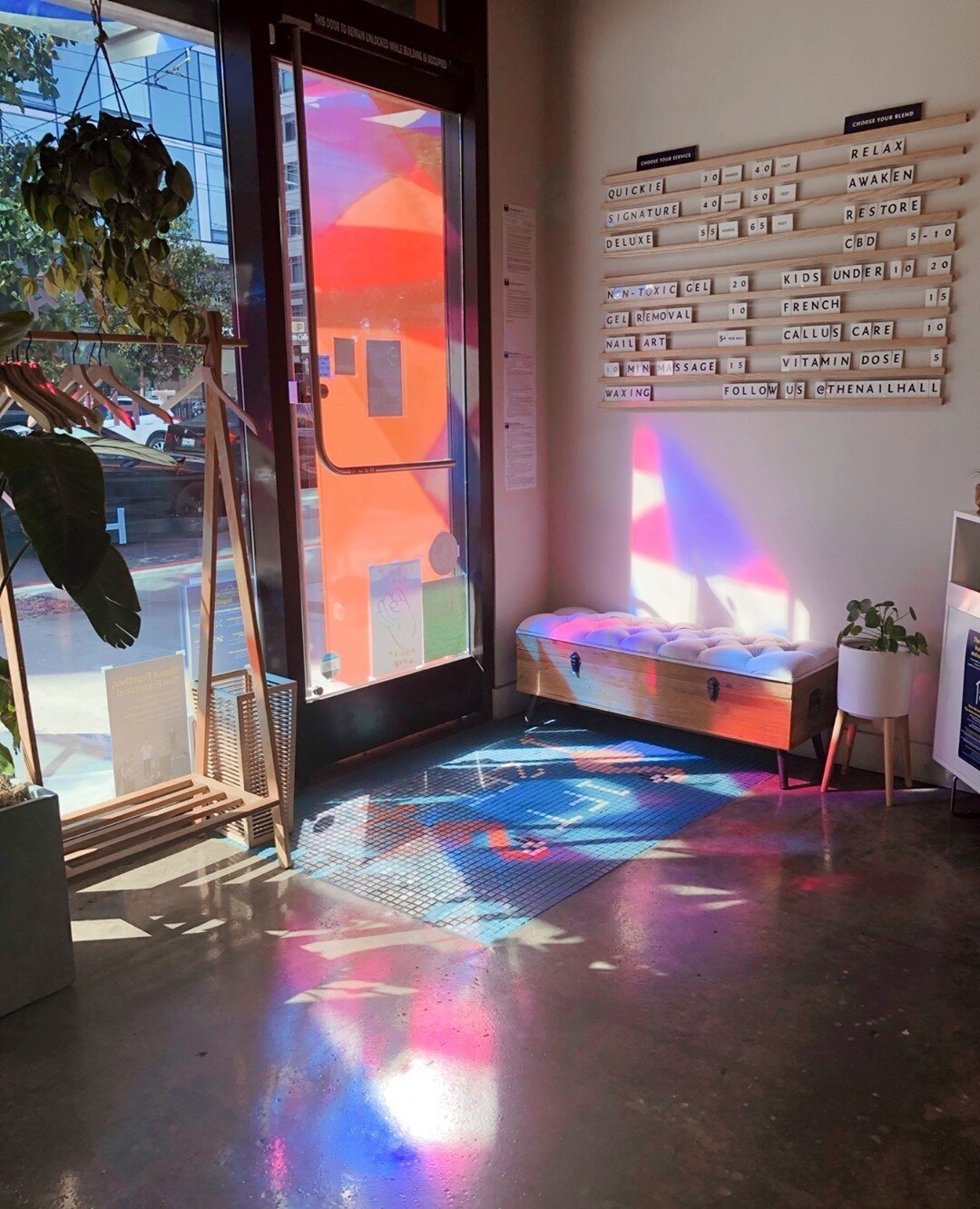 The light coming in through @nicolemariemueller installation is magical this time of year! We love supporting female creatives and working with her was an all time favorite project. Check out her page to see the huge new piece she's working on 🤩⁠
⁠
