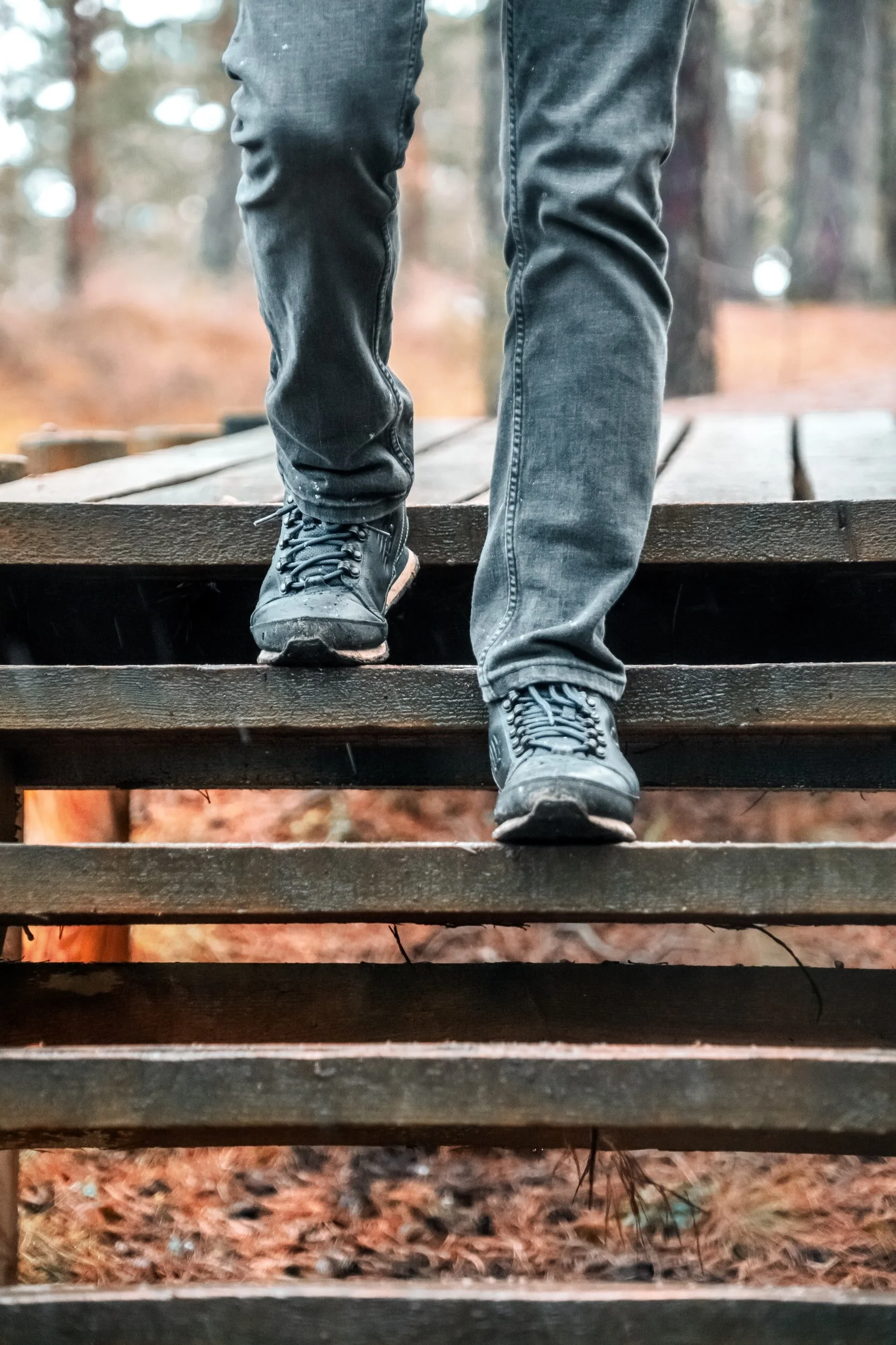 Where is the boy walking?