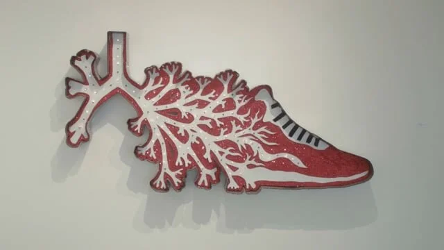 A Pair of Lungs, Air Jordans, And Praying Hands
