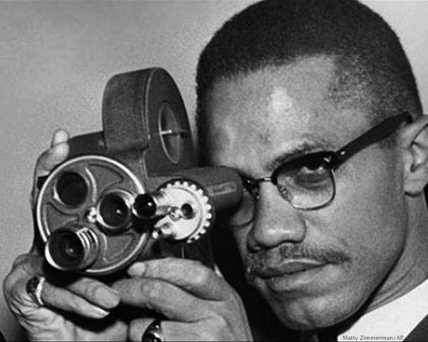Malcolm X With Camera I.jpg