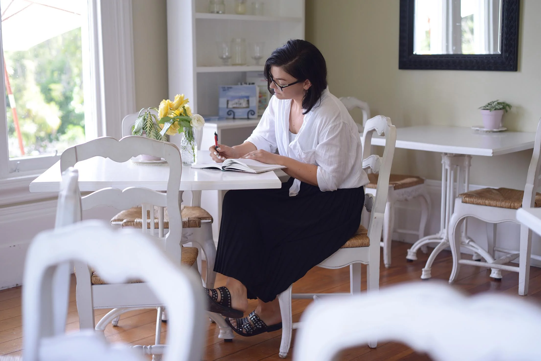 bex writing with journal.jpg