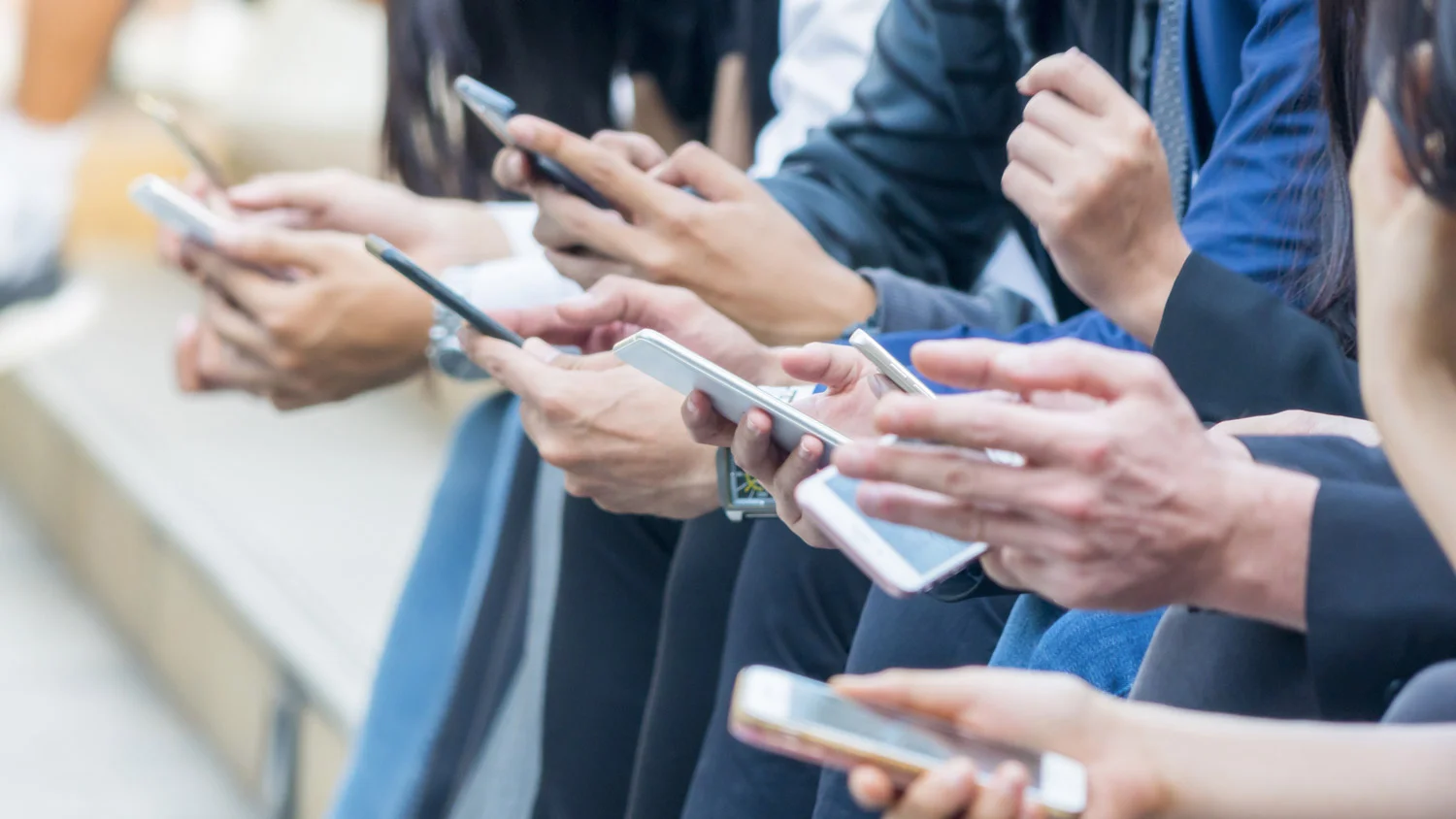 groupofhandwithsmartphone.jpg