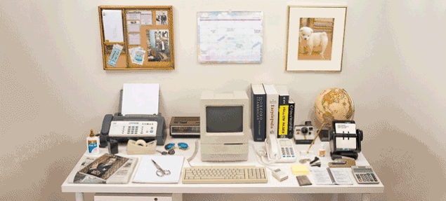 “ Evolution of the Desk ” is an initiative borne out of the Harvard Innovation Lab. The goal is to illustrate the impact that technology has had on our lives over the last 35 years. A cluttered desk, complete with a rolodex, a file cabinet, and a fax machine, transforms into a much cleaner, simpler surface consisting of only a laptop and a mobile phone. Of course, some things in life - like the sun - are everlasting, so the shades persist throughout the years. All of the vintage items featured in this video are authentic. The Macintosh Classic, corded phone, fax machine, globe, corkboard, Polaroid camera, and rolodex were all purchased through individual sellers on Ebay. The radio was acquired from Goodwill, and the picture frame came from pictureframes.com. The rest of the items were found lying around in basements, storage units, and garage sales. And the sunglasses? Those were easy since we actually still own a pair. How has your desktop changed over the years?
Content and video via Best Reviews , image via Gizmodo .