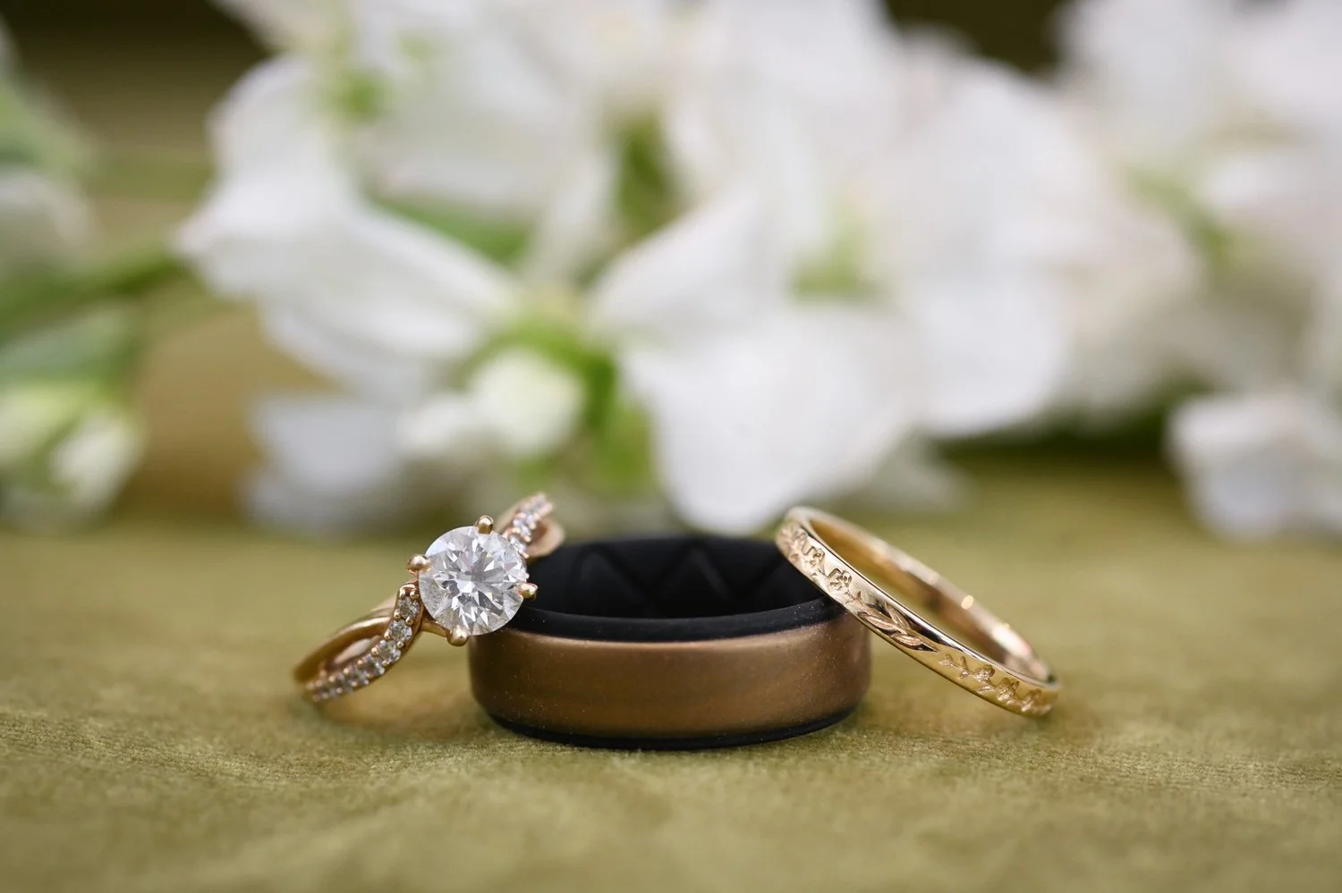 wedding rings with flowers flat-lay