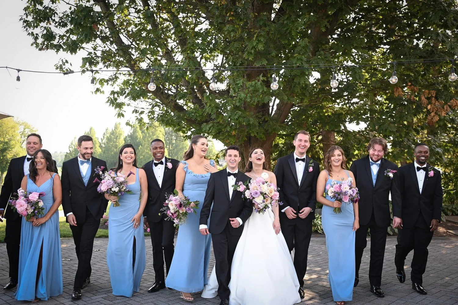 bridal party at wilmington country club having fun and laughing