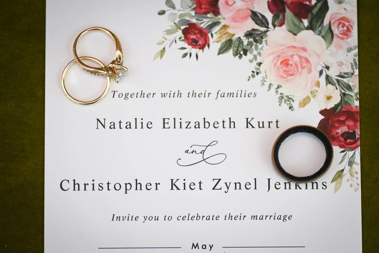 wedding invitation with bride and grooms rings
