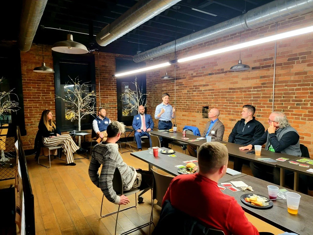   Kelly O’Bryant, Matt Setters, Matt Seifert, and Hub Program Director David Kilroy address participants at the Ignite Portsmouth Speaker Series and Happy Hour.     