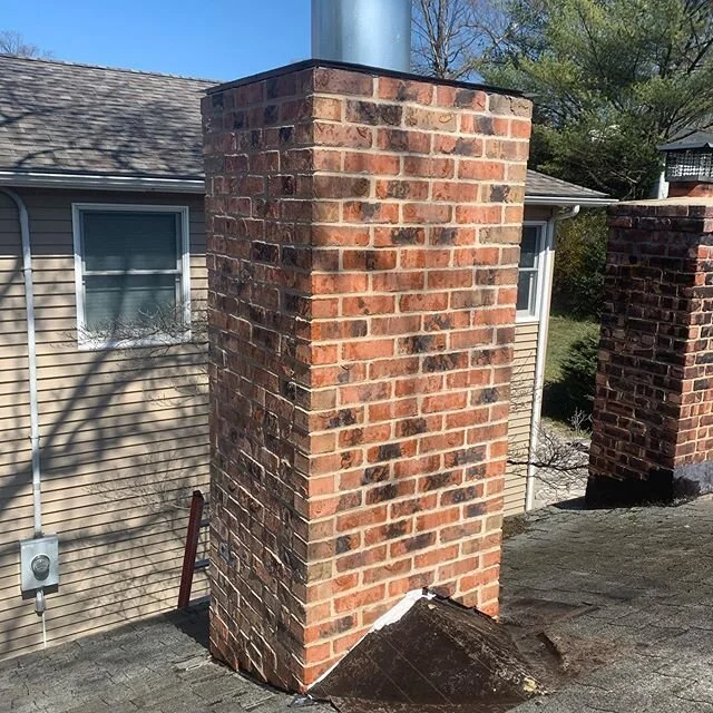 Framed chimney chase with @brickitofficial thin brick track system. Rustico style used brick veneer with a beige joint. This system is a cost effective way to get a real brick look without having to install structural footings to support a full brick