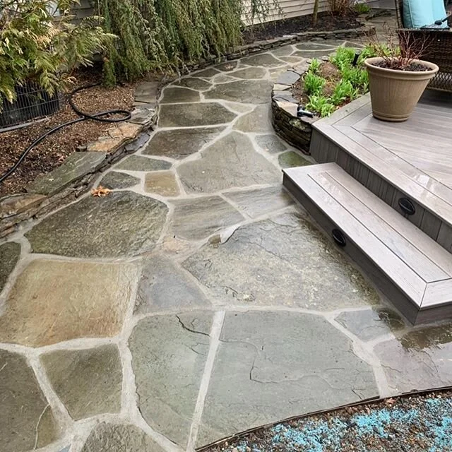 Finished this project around this time last year, natural irregular stone walkway with joints. With this material it only gets better with time, cant wait to get back out there! #contruction #mason #stone #walkway #masonry #patio #naturalstone #hards