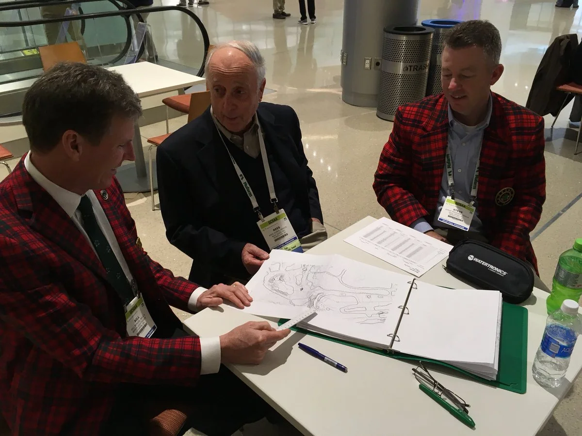 left to right—Bill Bergin, Rees Jones and Steve Wessier discuss the Course at McLemore.