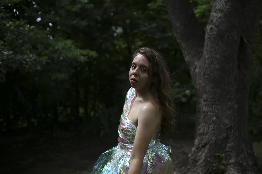 Entering into the enchanted forestall realms of the unknown with Claire Morales; photographed by Carrie Crumbley.