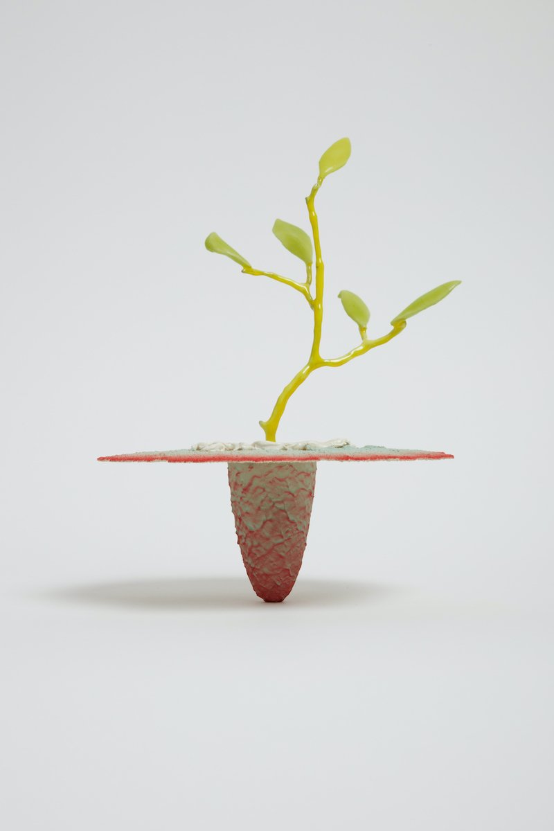   Obelisk (Seadragon) , 2021. cremated leaves, rare earth elements, ceramic, twig, resin, steel, glass, mahogany, maple. 