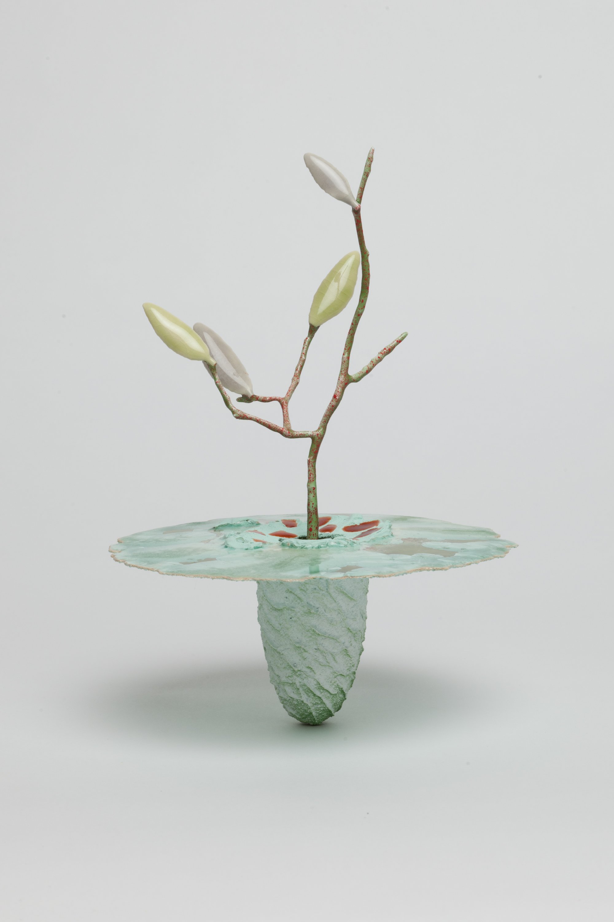   Obelisk (Genesis) , 2023. cremated leaves, rare earth elements, ceramic, twig, resin, steel, glass, mahogany, maple. 