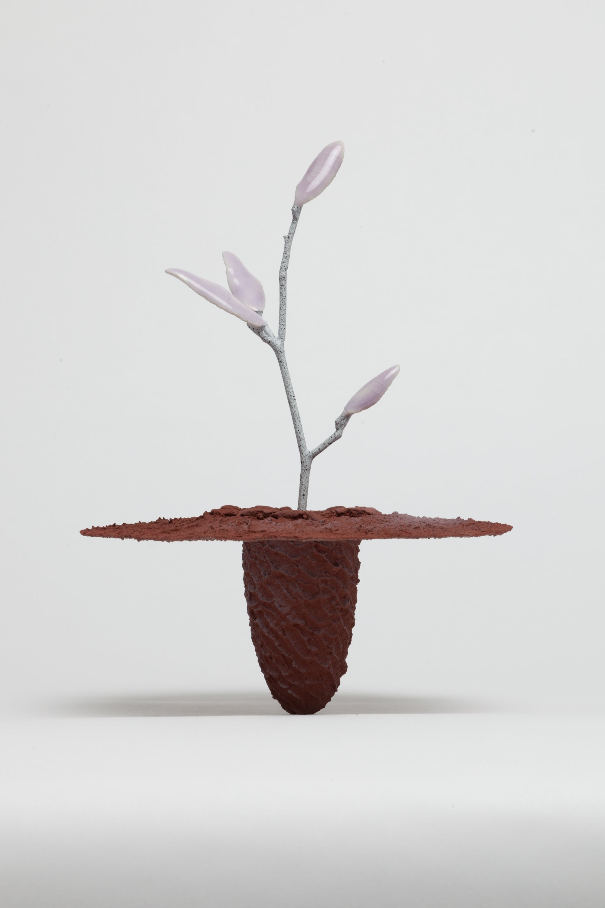   Obelisk (Regolith) , 2023. cremated leaves, rare earth elements, ceramic, twig, resin, steel, glass, maple, walnut. 