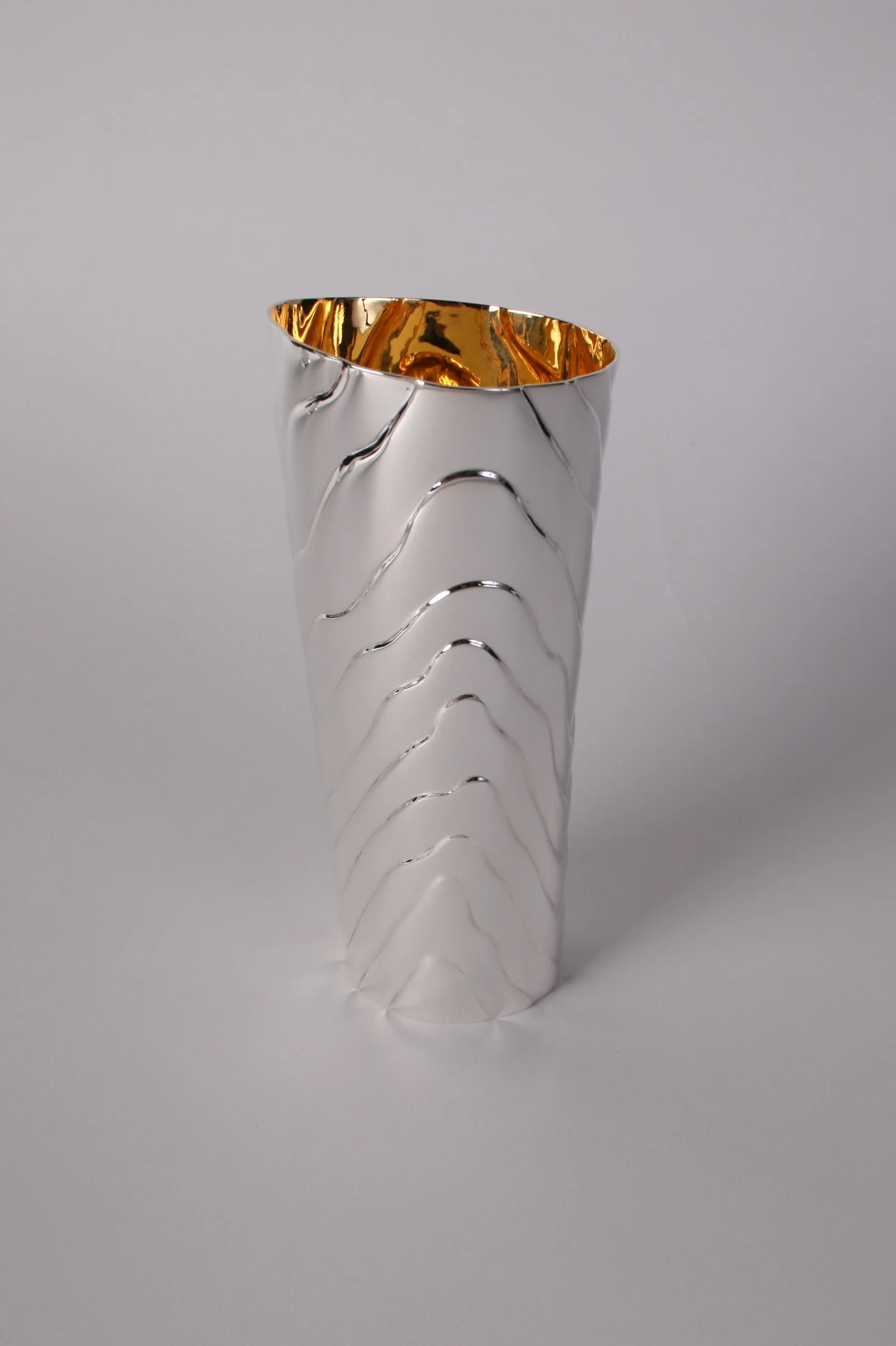  Squirrel follicle beaker, TIG welded Britannia silver and chased. 150mm in height. 