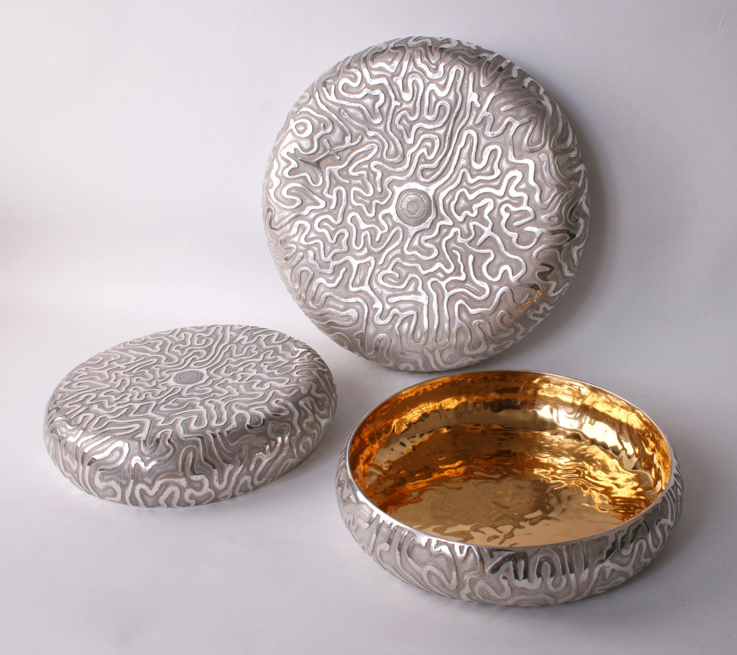 Brain coral bowls, rasied in Britannia silver they are acid etched and gold plated