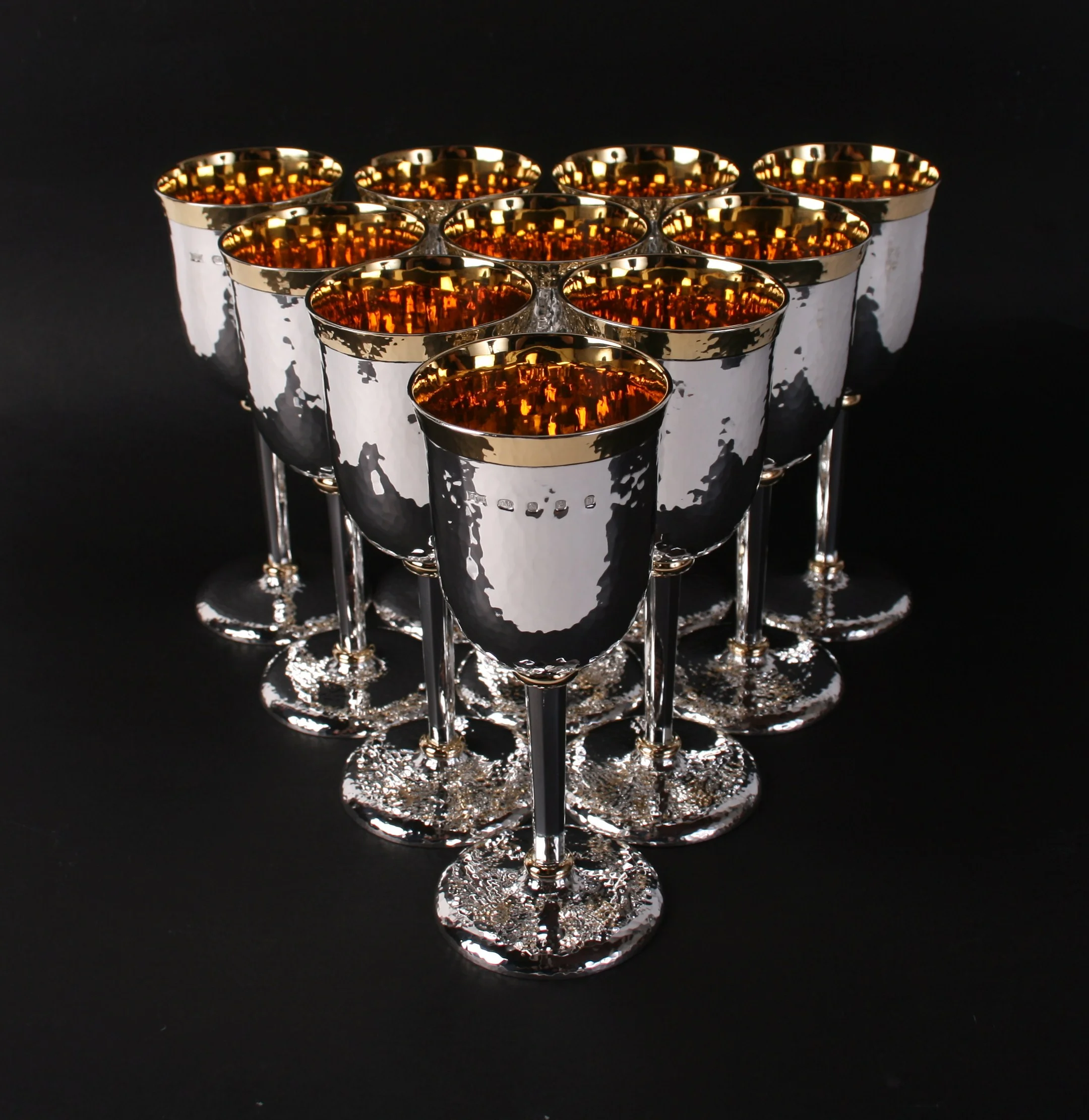  Set of 10 Goblets with octagonal stems and 22 ct gold details. 160 mm in height 