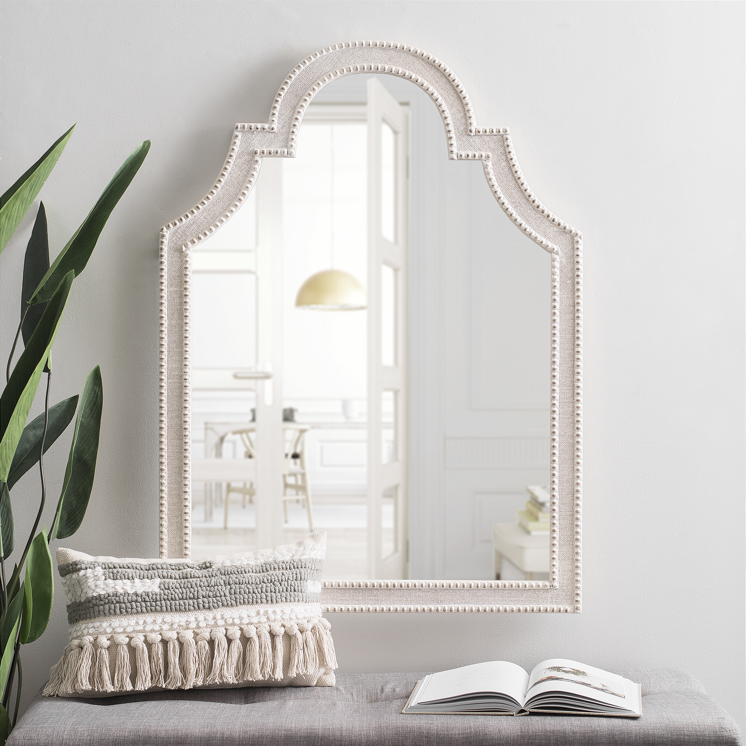 "I love the shape and detail of this mirror. Perfect for getting one last glance before you're out the door!"