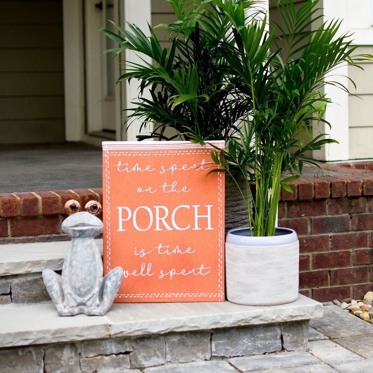 Time spent on the porch is time well spent. 🙌 Help us name this little guy in the comments below and we'll pin the best comments! 👇	
.
#kirklandsfinds #kirklandshappiness #bringhappinesshome #frontporchdecor #frontporch #outdoorliving #gardenstatue