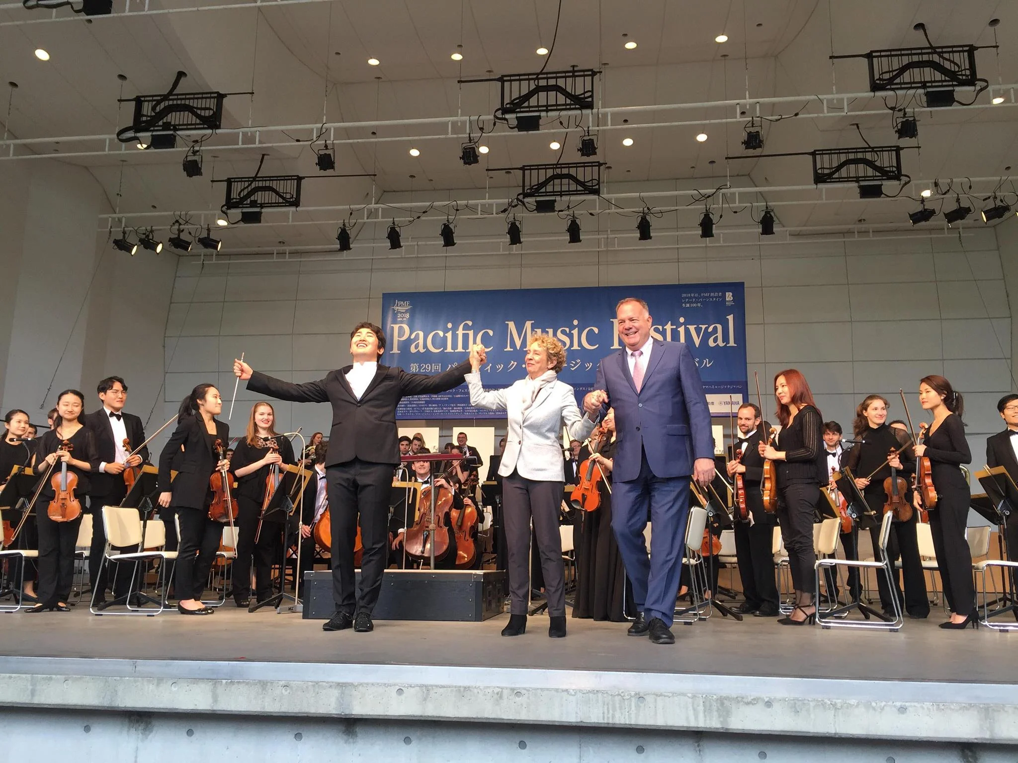 On stage at the Pacific Music Festival with Conductor Keitaro Harada and Craig Urquhart.