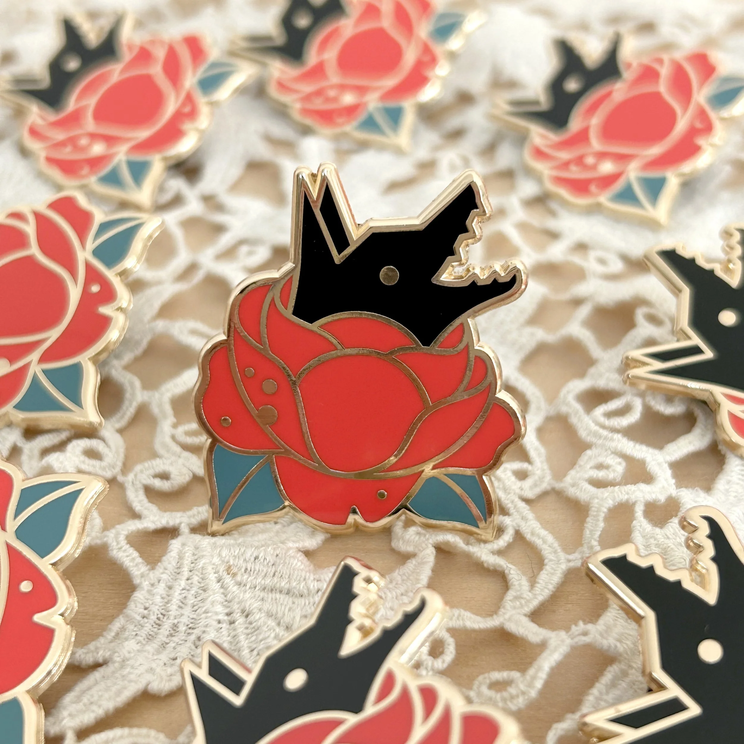 wolf rose pin multiple copy.jpg