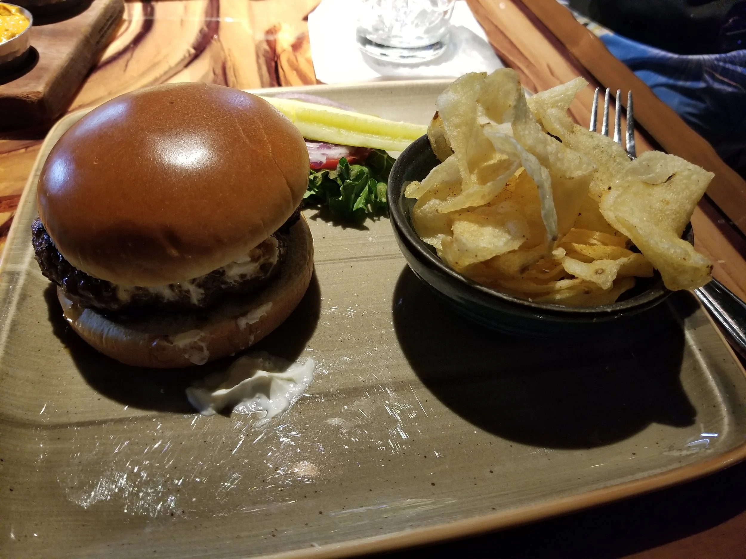 Sanaa Burger Spiced Mustard and Peppadew-Goat Cheese served with Sanaa Chips and Pickle Spear ($18.00)