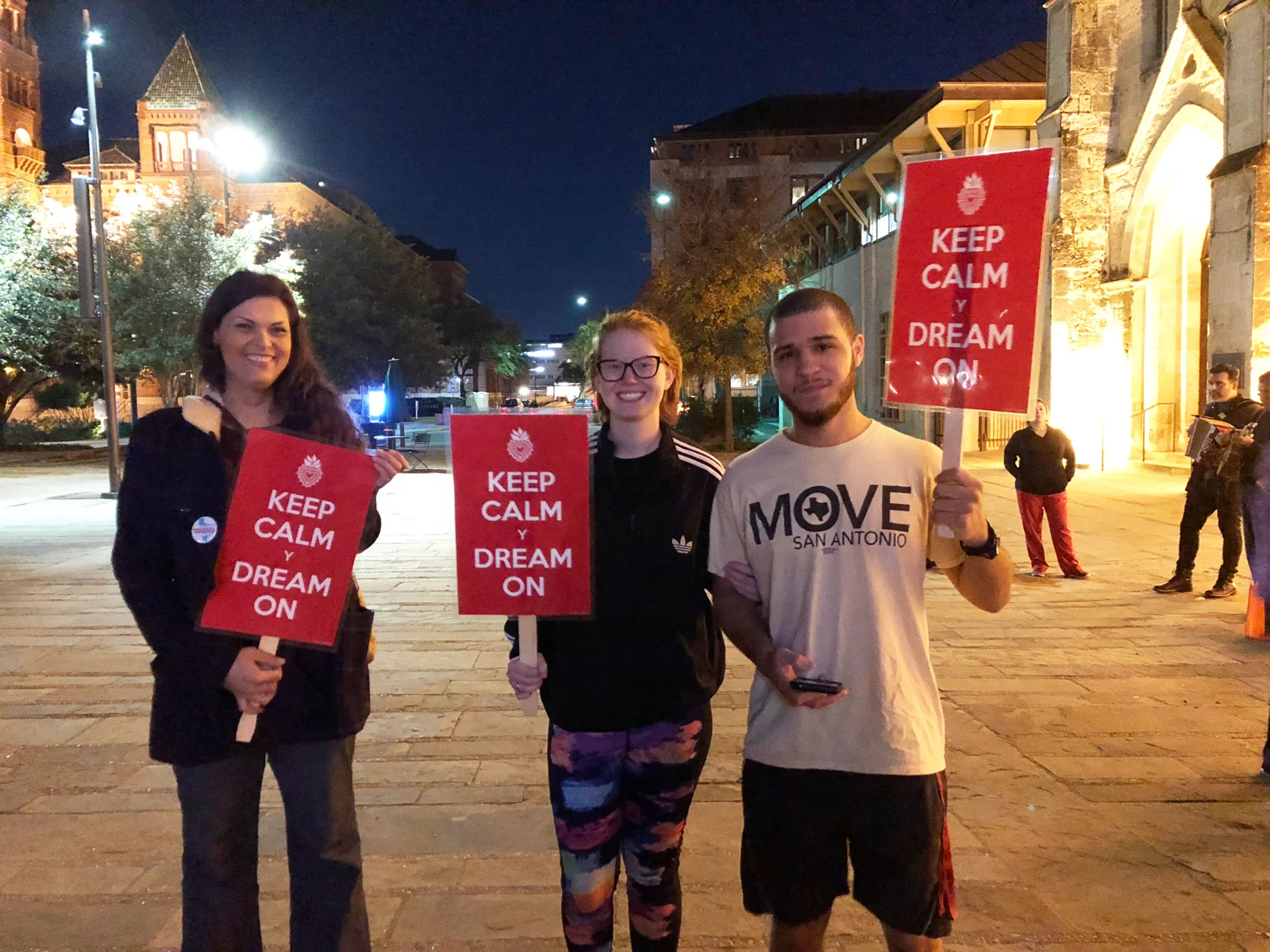 Supporters holding Keep Calm y Dream On signs at a rally for the dreamers in San Antonio, TX. Photo by KSosa