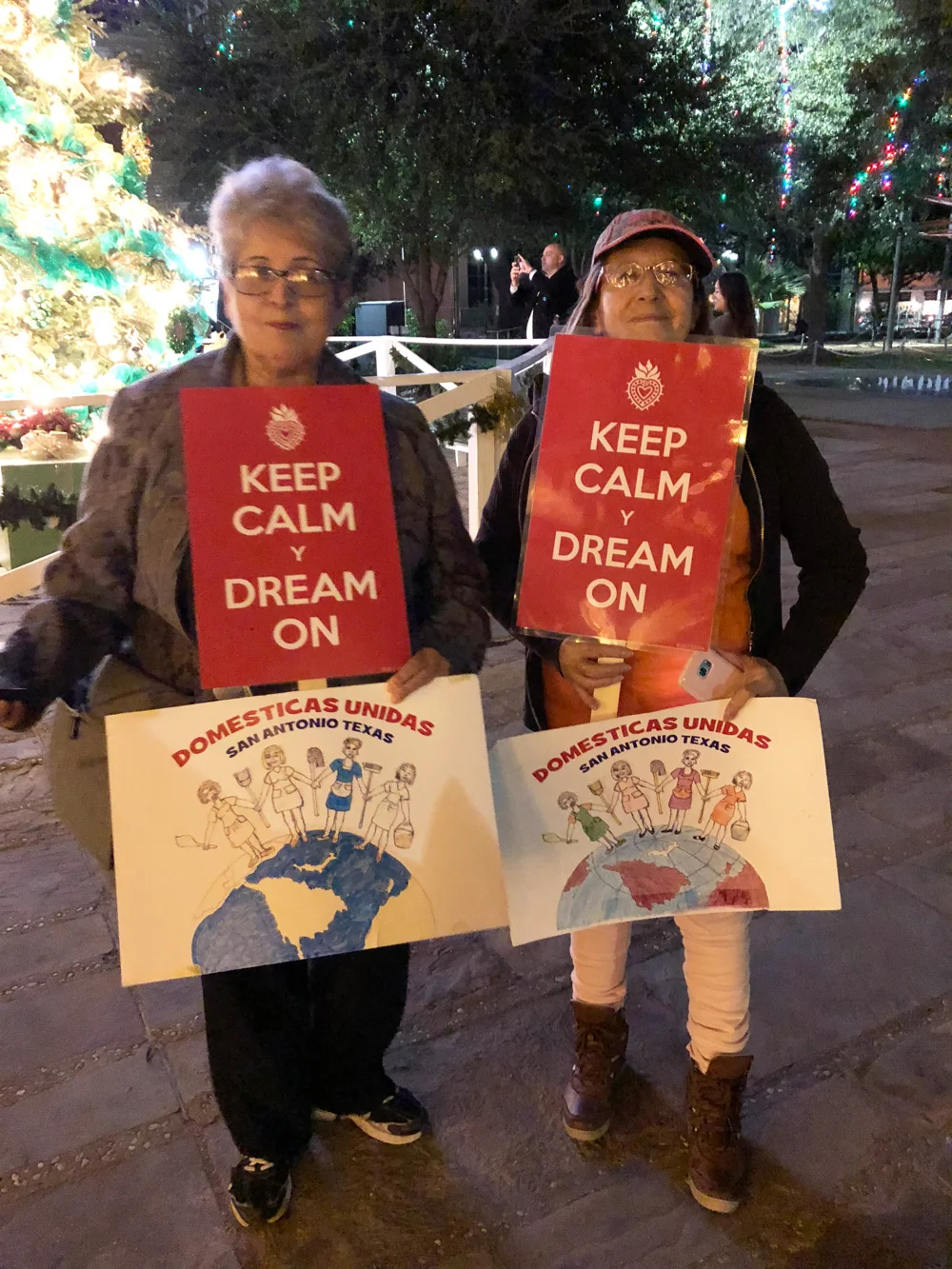 Supporters holding Keep Calm y Dream On signs at a rally for the dreamers in San Antonio, TX. Photo by KSosa
