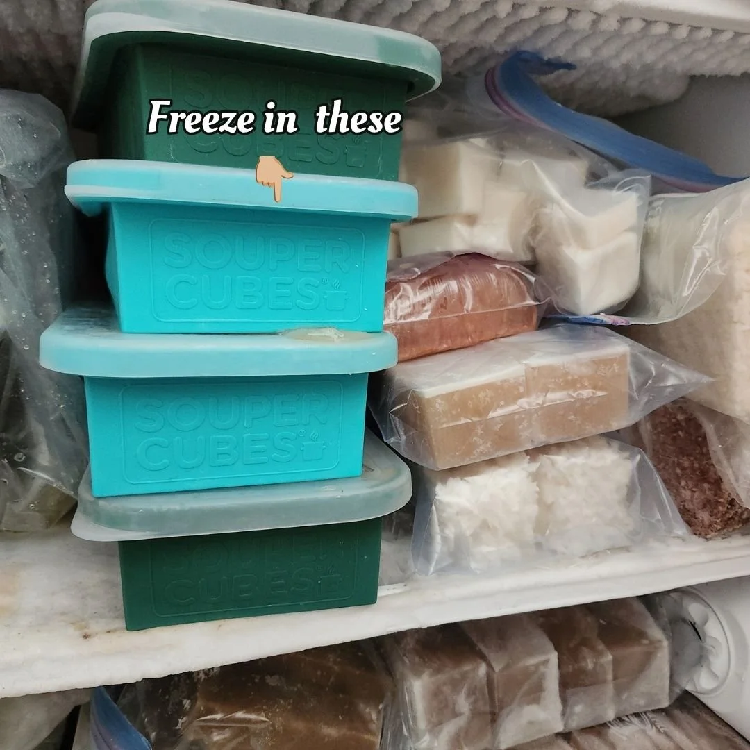 Souper Cube Silicone Trays with frozen portions of broth and meals in freezer bags