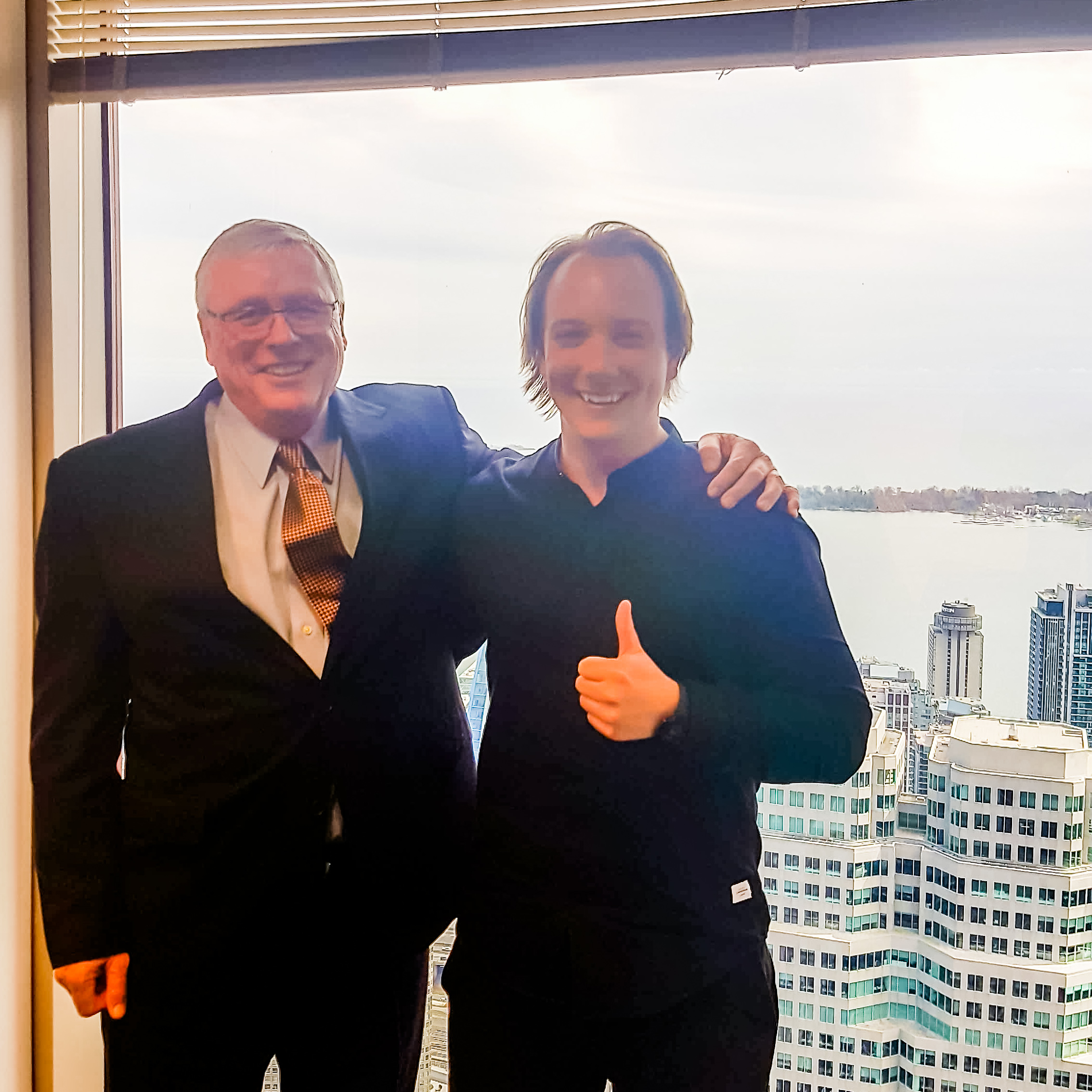 GetintheLoop CEO Matt Crowell (right) with former Canadian Western Bank CEO Larry Pollock, who helped developed the in-house financing program for GetintheLoop Local.