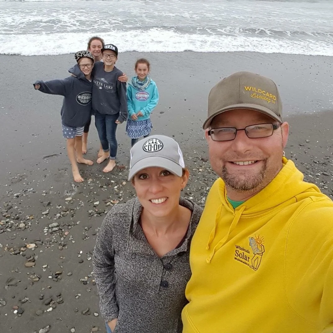 Kirstin and her family having fun on the beach