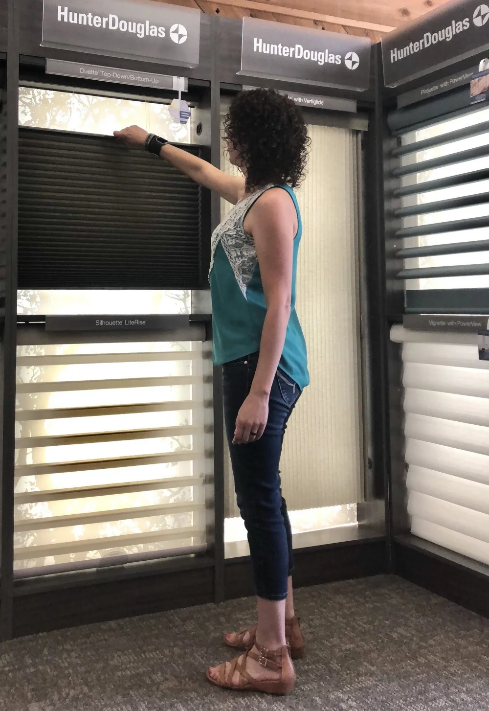 Kristen working with the blinds