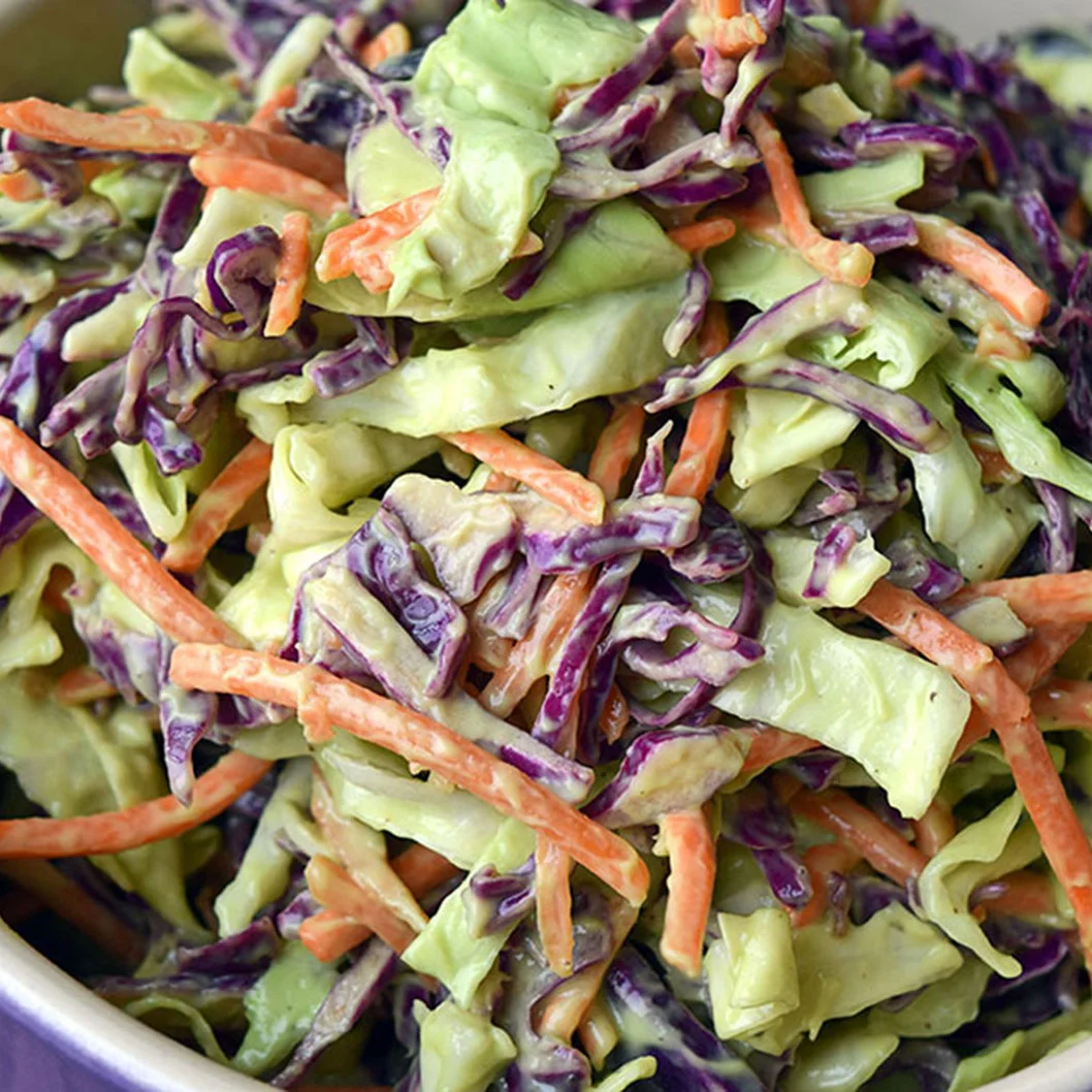Creamy and colorful vegan coleslaw made with avocado